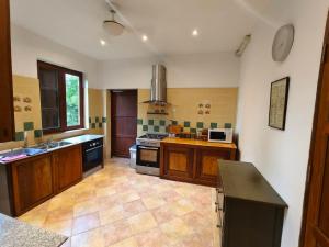 Kuchyň nebo kuchyňský kout v ubytování Banthi Homestay