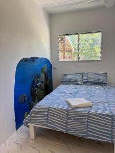 Postel nebo postele na pokoji v ubytování Island Dreams Villa, Coastal Paradise in Vanuatu