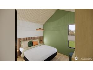 Ένα ή περισσότερα κρεβάτια σε δωμάτιο στο 6-person holiday home for relaxing retreat