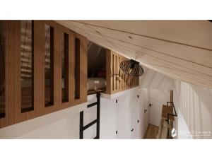 an overhead view of a staircase in a house at 6-person holiday home for relaxing retreat in Balkbrug