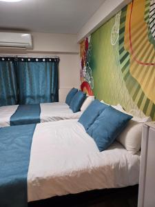 Ένα ή περισσότερα κρεβάτια σε δωμάτιο στο BandK Numabukuro 202