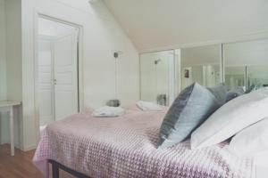 Postel nebo postele na pokoji v ubytování Lilleeid Lodge