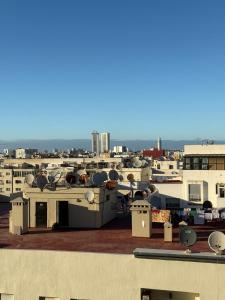 a view of a city from the roof of a building at Luxury city center tram abdelmoumen in Casablanca