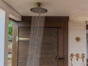 a net hanging from the ceiling above a door at Humpback Villa in Kingscliff +17 photos