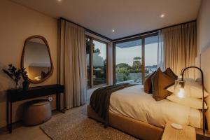 Postel nebo postele na pokoji v ubytování Villa Lumaire - Leisure Island + 32 fotografií