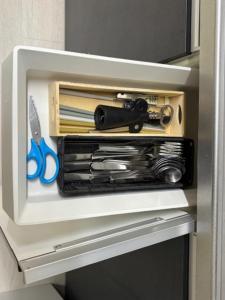 a drawer full of utensils in a refrigerator at 板橋 RCアネックス Rc205 in Tokyo