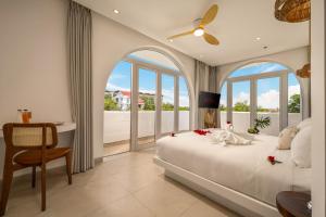 Ένα ή περισσότερα κρεβάτια σε δωμάτιο στο King Villa & Spa Hoi An +63 φωτογραφίες