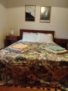 Postel nebo postele na pokoji v ubytování House in Trikala