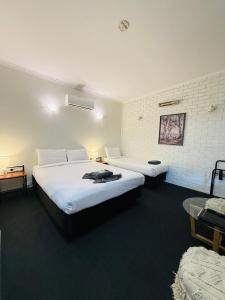 Postel nebo postele na pokoji v ubytování Motel St Arnaud