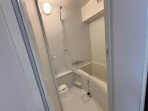 a bathroom with a shower and a bath tub at 板橋 RCアネックス Rc206 in Tokyo +7 photos