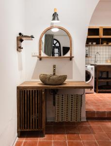 a bathroom with a sink and a mirror at Lakeside Horizon Boutique Suites-1 min to Hoan Kiem Lake-Free Airport in Hanoi