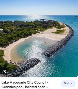 an aerial view of a small island in the ocean at Charlestown Central 7 Bedrooms Front House and Back Unit in Charlestown
