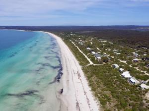 an aerial view of a beach and the ocean at Beachside Cabin No 2 at Island Beach in Island Beach +1 photo