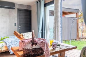 Posezení v ubytování O Petit Jardin