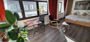 Postel nebo postele na pokoji v ubytování 50qm 2,5 Zi Wohnung in Siegens Oberstadt + 18 fotografií