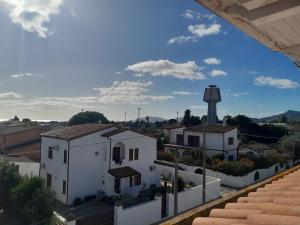 a view from the roof of a building with a water tower at Appartement à 300 m de la mer in Nughedu Santa Vittoria