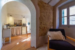 O bucătărie sau chicinetă la Il Sacellum