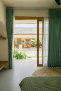 Postel nebo postele na pokoji v ubytování Turtle Villa