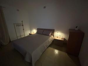 Un pat sau paturi într-o cameră la Bag's house