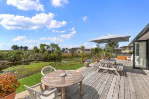 Κήπος έξω από το Home Away From Home - Ruakaka Escape