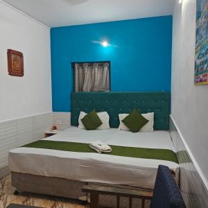 Ένα ή περισσότερα κρεβάτια σε δωμάτιο στο Shri jii palace