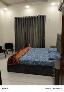 Ένα ή περισσότερα κρεβάτια σε δωμάτιο στο Luxurious home