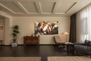 Posezení v ubytování Lijiang Linqi · Rizhao Jinshan Snow Mountain Panorama · Art SPA Hotel (Shuhe Ancient Town Branch)