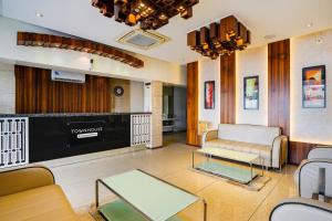 Posezení v ubytování Super Townhouse Jhalawar Road Gumanpura Formerly Rockland