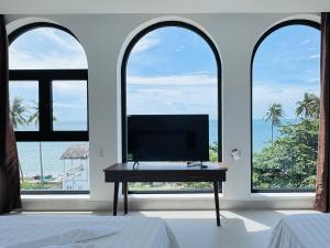 TV a/nebo společenská místnost v ubytování Ripple house