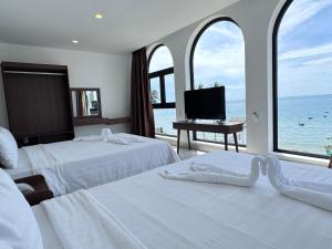 Postel nebo postele na pokoji v ubytování Ripple house