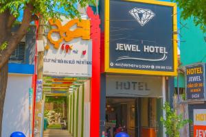 a row of buildings with a hotel sign at Jewel Hotel in Ho Chi Minh City