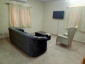 TV a/nebo společenská místnost v ubytování Villa Prestige