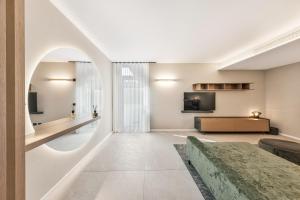 Un televizor și/sau centru de divertisment la Lazise Pool Villa - Classique