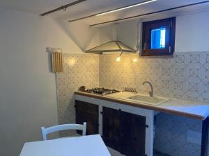 Η κουζίνα ή μικρή κουζίνα στο Col di Lana +31 φωτογραφίες