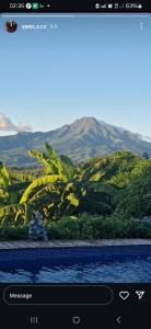 a view of a mountain from a computer screen at Gîte au Carbet in Le Morne aux Bœufs