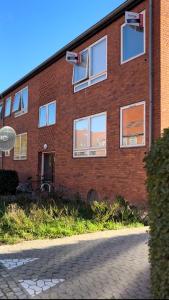 Budova, kde se apartmán nachází + 7 fotografií