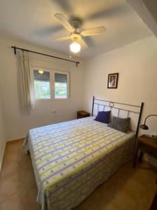 En eller flere senge i et værelse på La Casa del bosque