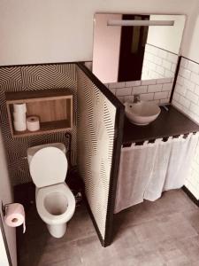 Koupelna v ubytování La petite Maison + 10 fotografií