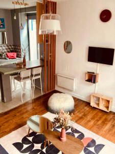 TV a/nebo společenská místnost v ubytování La petite Maison