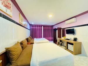 TV a/nebo společenská místnost v ubytování The Cozy Corner-Budget Hotel