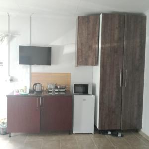 Η κουζίνα ή μικρή κουζίνα στο Mthembu Executive Accomodation +33 φωτογραφίες