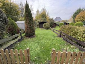 Κήπος έξω από το Ferienhaus "MeerZeit"