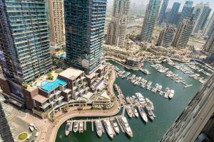 an aerial view of a marina with boats at New Horizon 2 Bed Room LUXURY APARTMENT JBR in Dubai