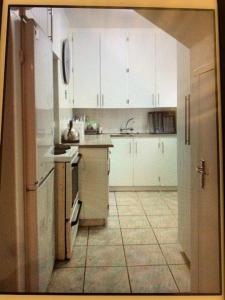 Η κουζίνα ή μικρή κουζίνα στο Karlin #2, Frontline, Beach Access, Scottburgh +12 φωτογραφίες