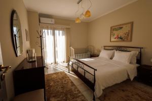 Ένα ή περισσότερα κρεβάτια σε δωμάτιο στο White lavender house