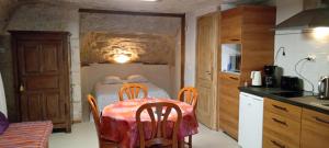 Kuchyň nebo kuchyňský kout v ubytování Troglo De Denise
