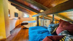 a bedroom with two bunk beds in a house at Borgo Felice Fontana - Affitti Brevi Italia in Monfol