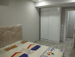 En eller flere senge i et værelse på Polana Plaza