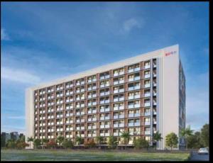 a rendering of a large building with trees in front of it at Petal Stays - Just 1 Km from Airport in Pune