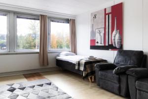 Postel nebo postele na pokoji v ubytování Spacious and cozy 2 bedroom apartment for 7